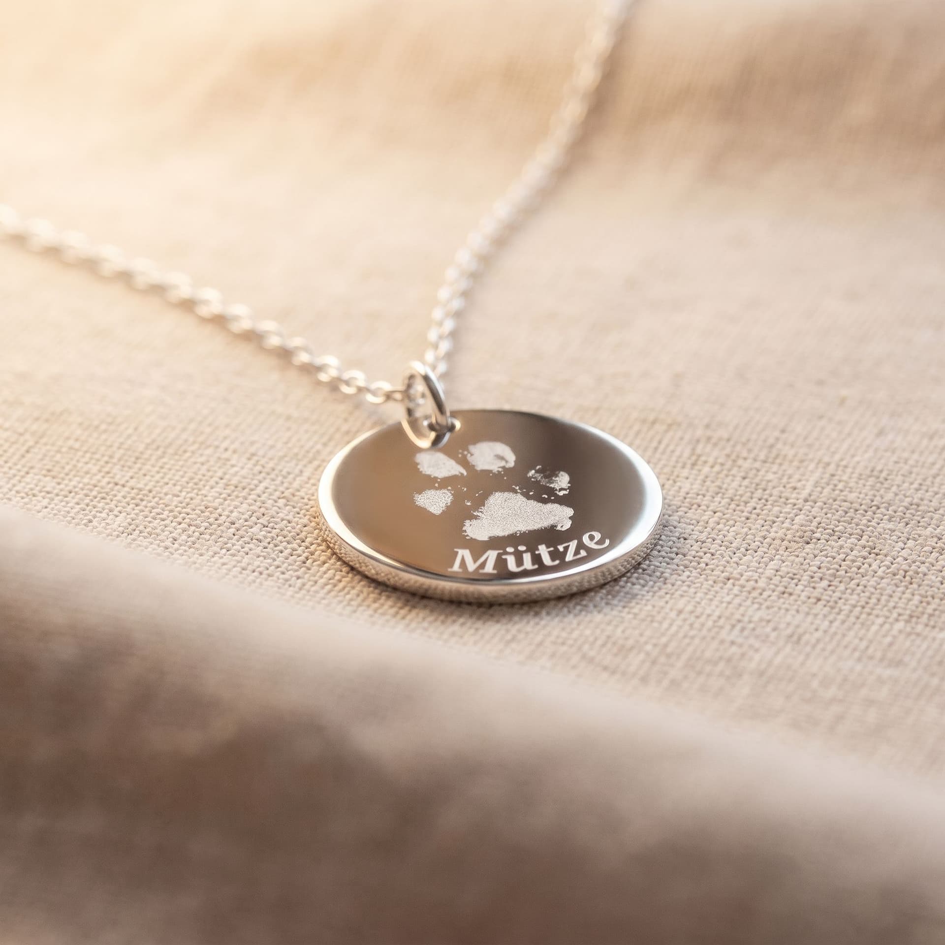 Luna Pendant with Pawprint - close-up detail view, second angle