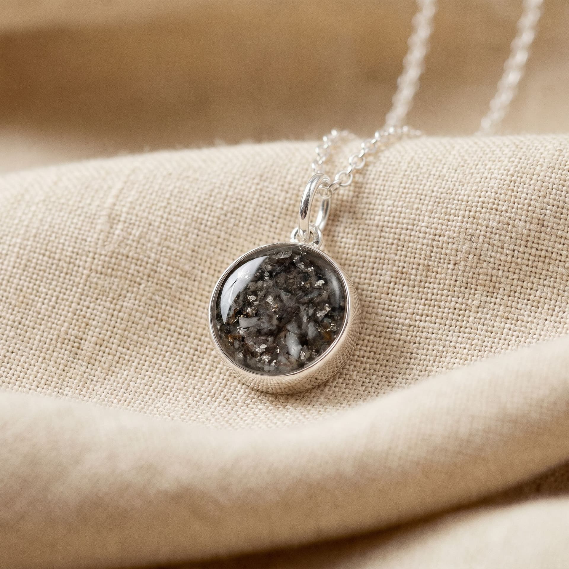 Circle of Life Pendant with Ashes (12 mm) - close-up detail view, third angle