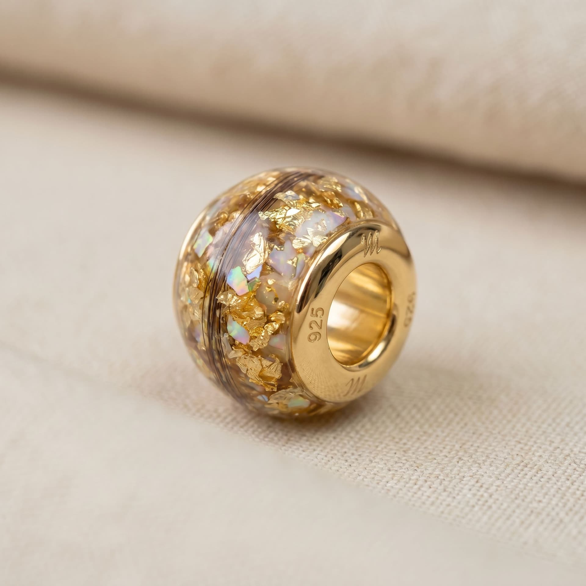 Pandora Charm with Ashes (14K Gold) - close-up detail view, third angle