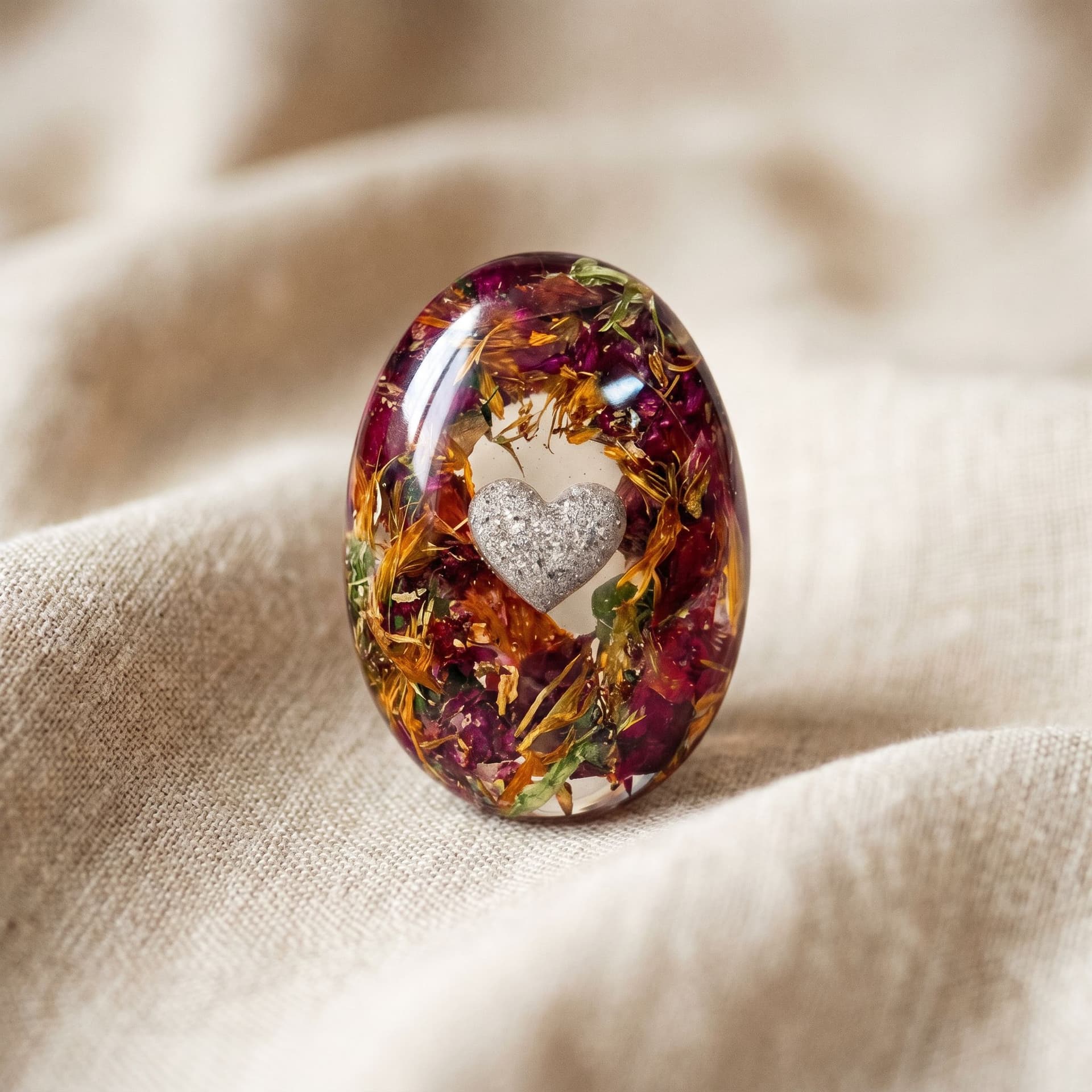 Oval Memory Stone with Heart-Shaped Ashes - close-up detail view, third angle