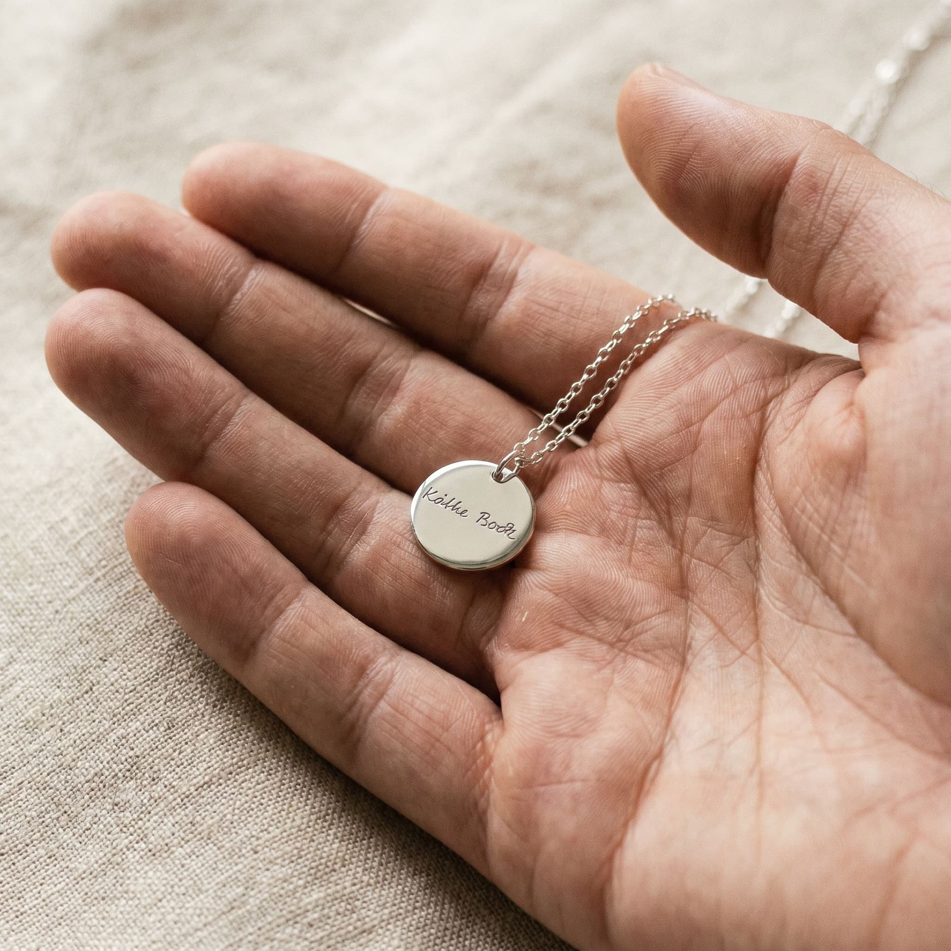 Julia Pendant with Handwriting - held in hand