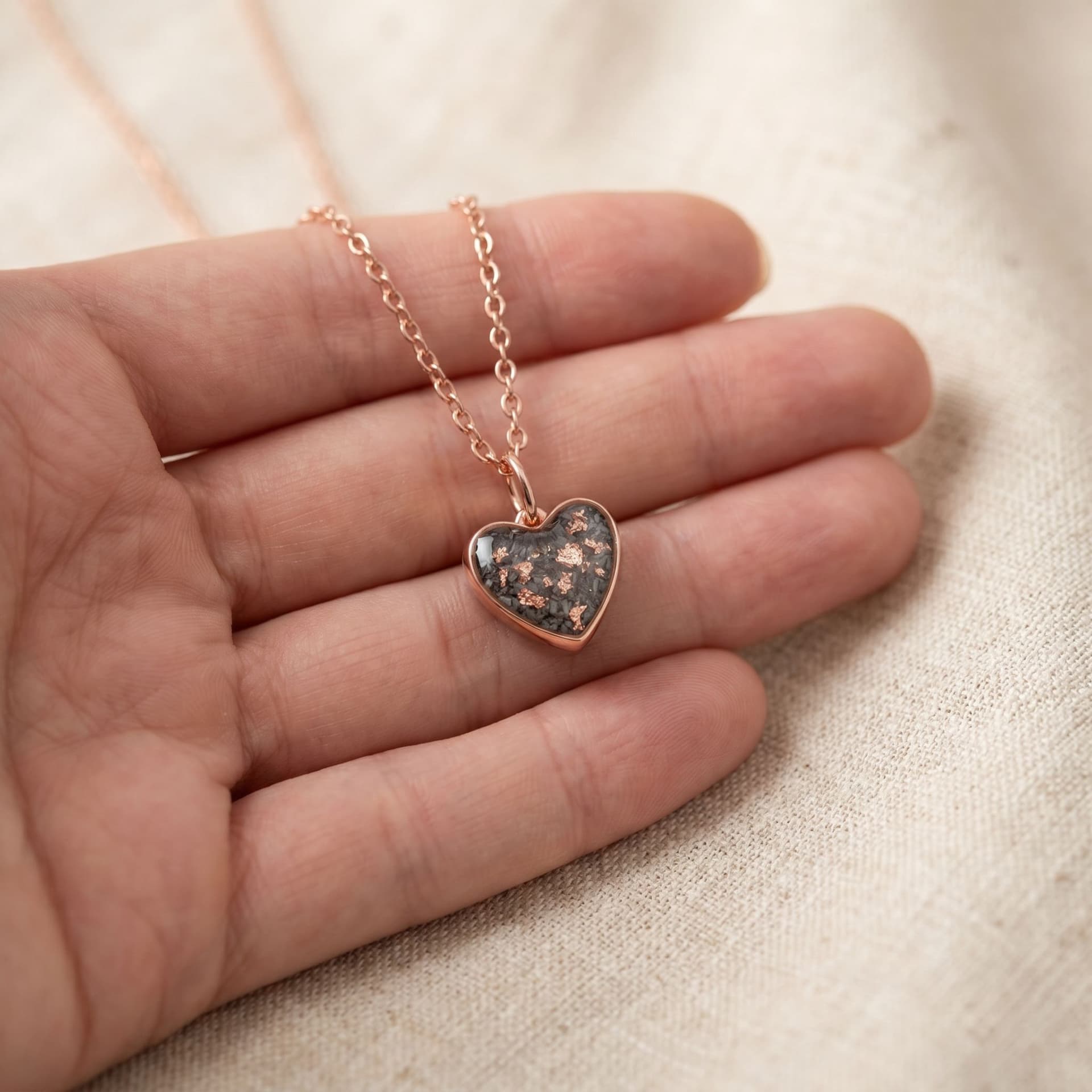 Sweetheart Necklace with Ashes - held in hand