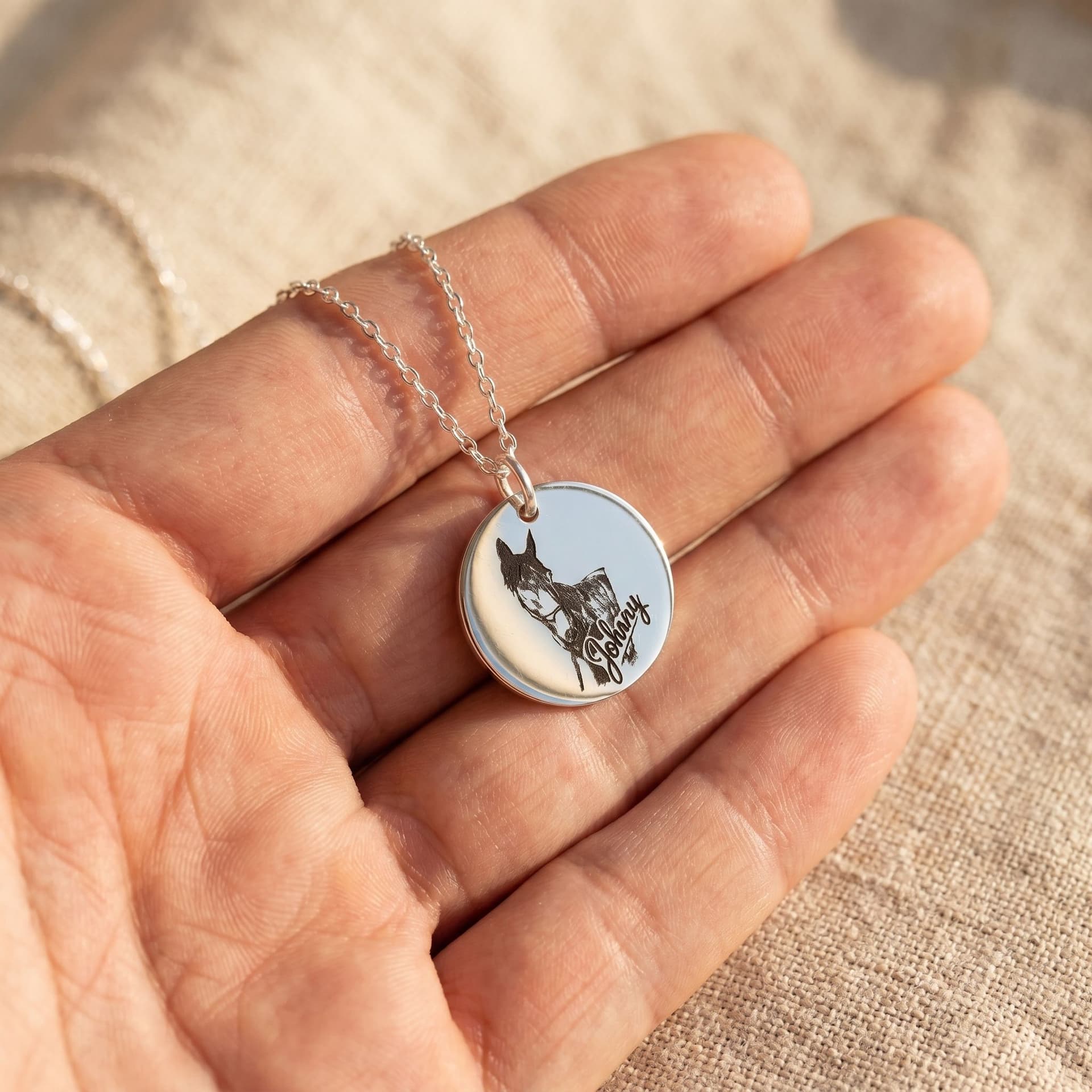Luna Pendant with Portrait - held in hand, second view
