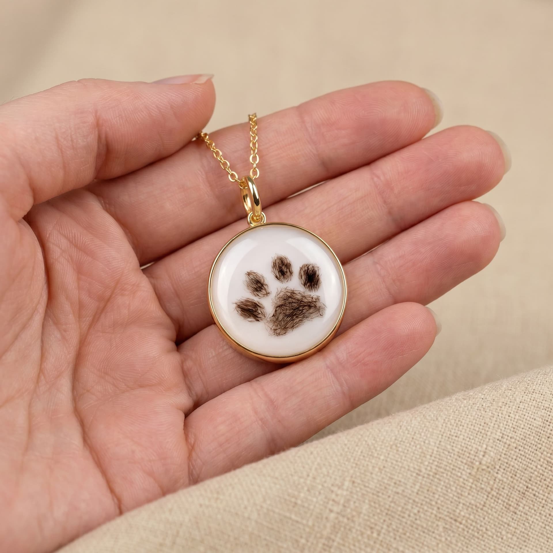 Circle of Life Pendant with Pet Fur, Paw (18 mm) - held in hand, second view