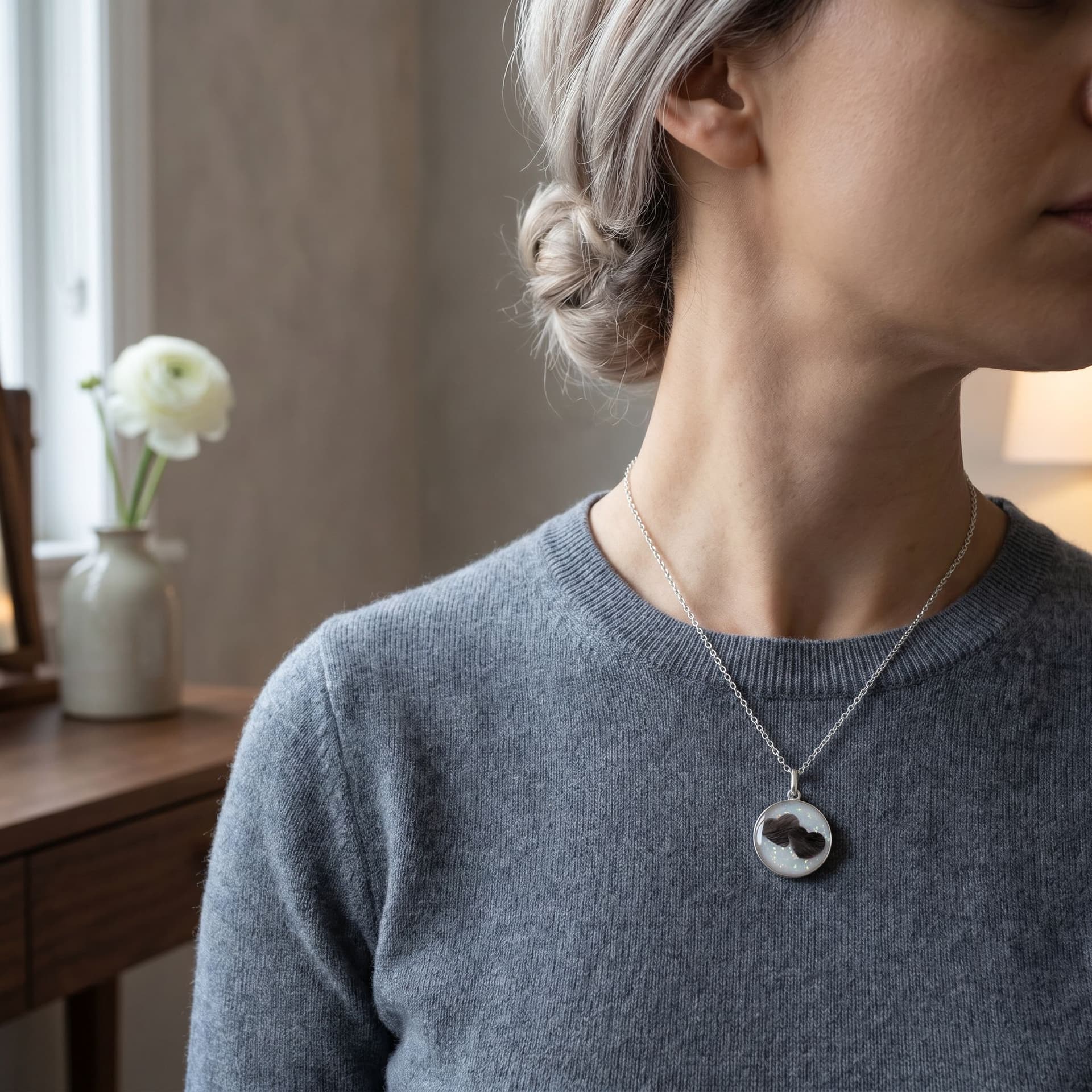 Circle of Life Pendant with Pet Fur, Two Hearts (18 mm) - worn by a model, second view